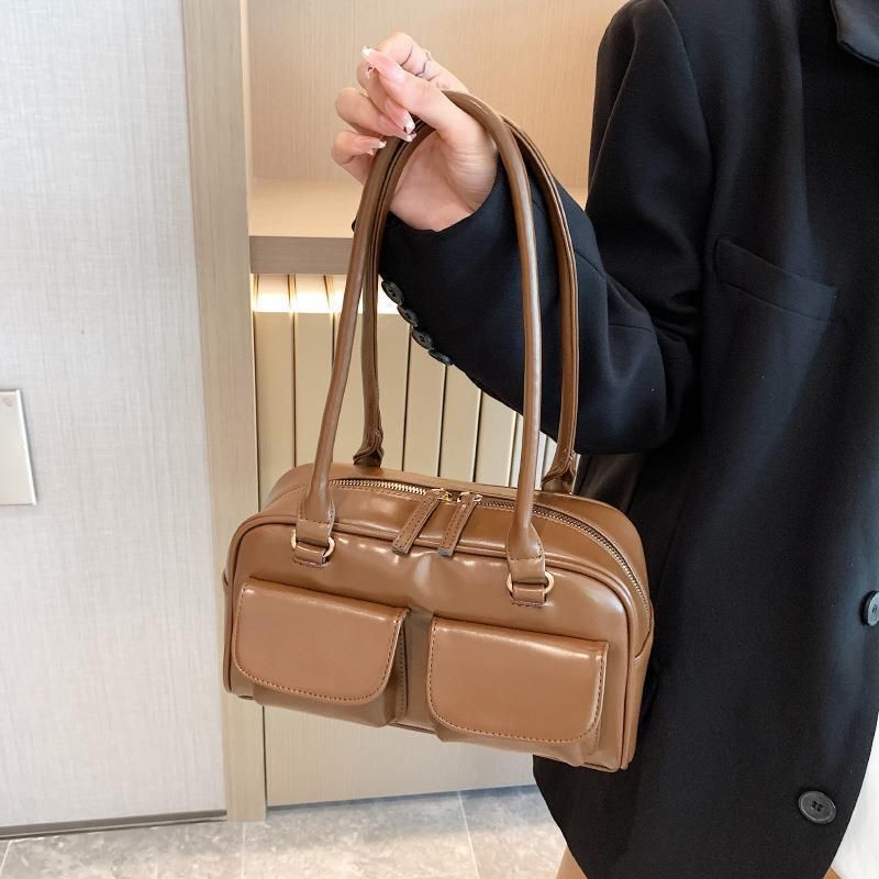 Multi Pocket Zip Leather Handbag