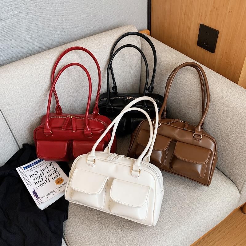 Multi Pocket Zip Leather Handbag