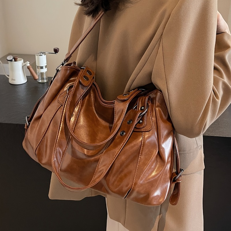 Women’s Handbag with Multiple Zipped Compartments