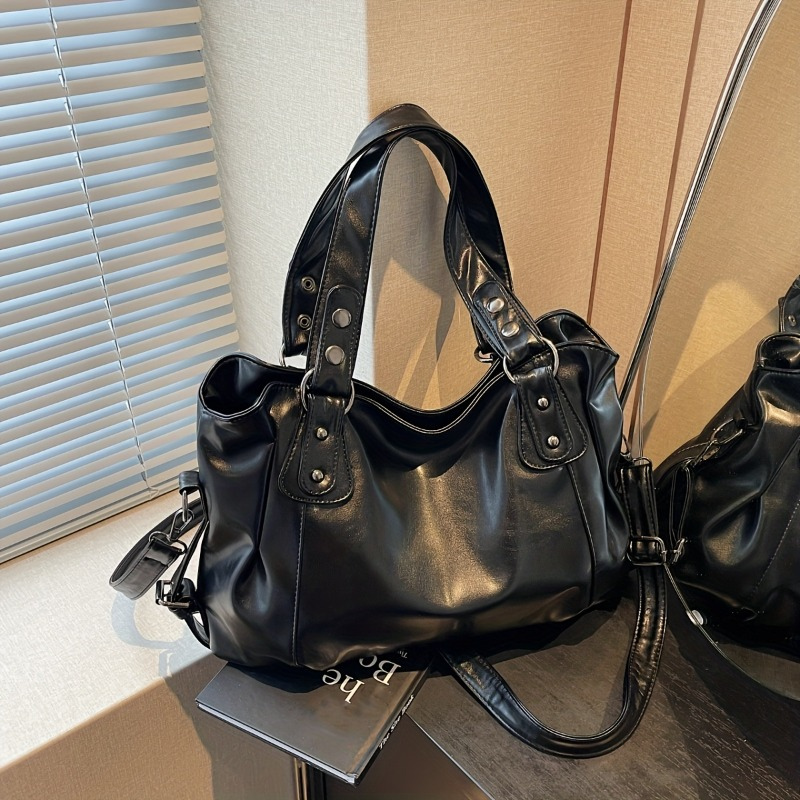 Women’s Handbag with Multiple Zipped Compartments