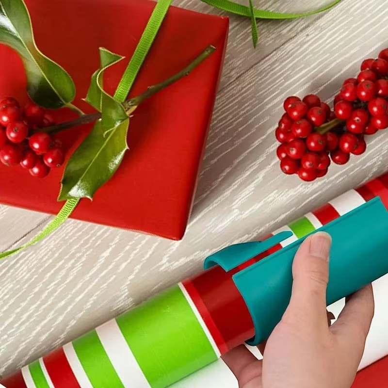 Wraptora - Ajándékcsomagoló vágó beépített pengével és rugalmas zsanérral