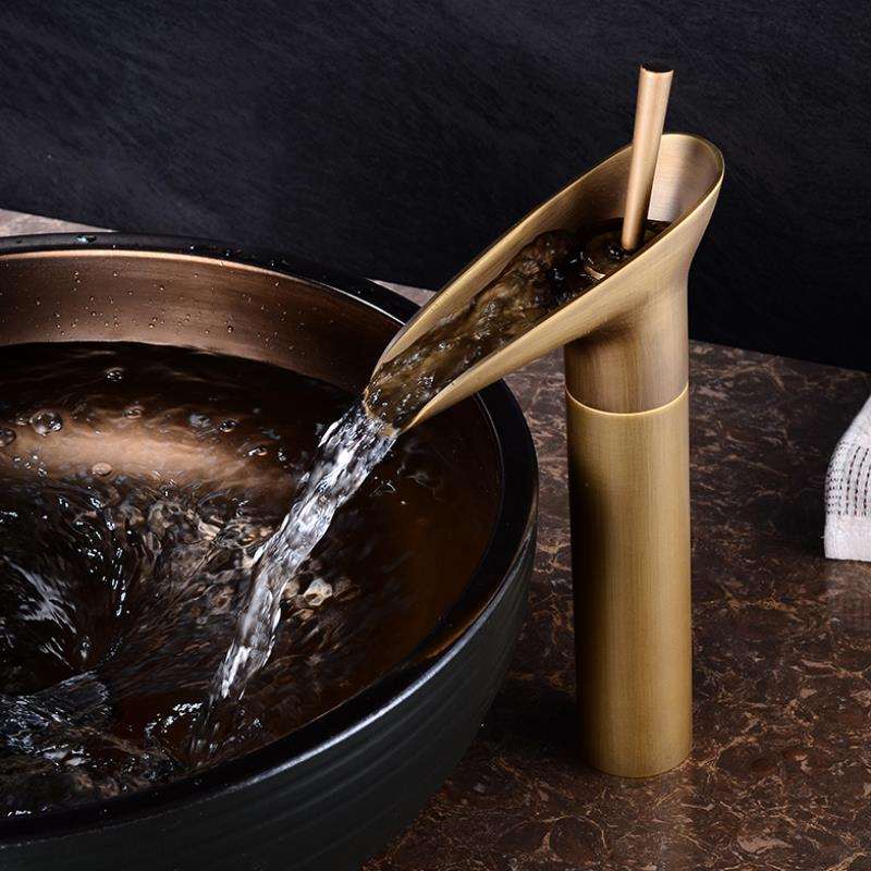 AquaFalls - Vintage Waterfall Bathroom Faucet Antique Brass Finish with Gentle Cascading Flow | Single-Handle Design for Effortless Water Control | Elegant Accent to Enhance Bathroom Aesthetics