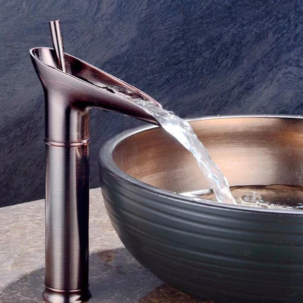 AquaFalls - Vintage Waterfall Bathroom Faucet Antique Brass Finish with Gentle Cascading Flow | Single-Handle Design for Effortless Water Control | Elegant Accent to Enhance Bathroom Aesthetics